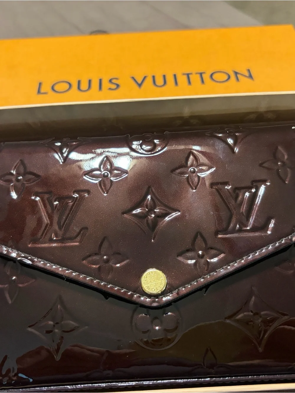 Louis Vuitton Burgundy Patent Leather Interior with Gold Chain Accent